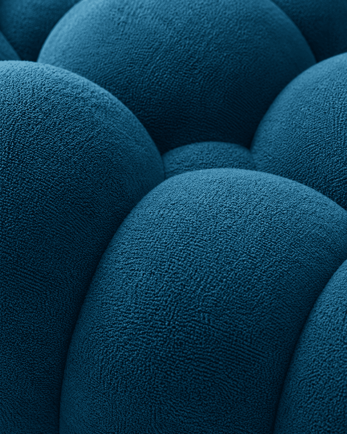 Macro close-up of textured petrol blue Bubble Sofa upholstery